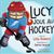 Lucy joue au hockey